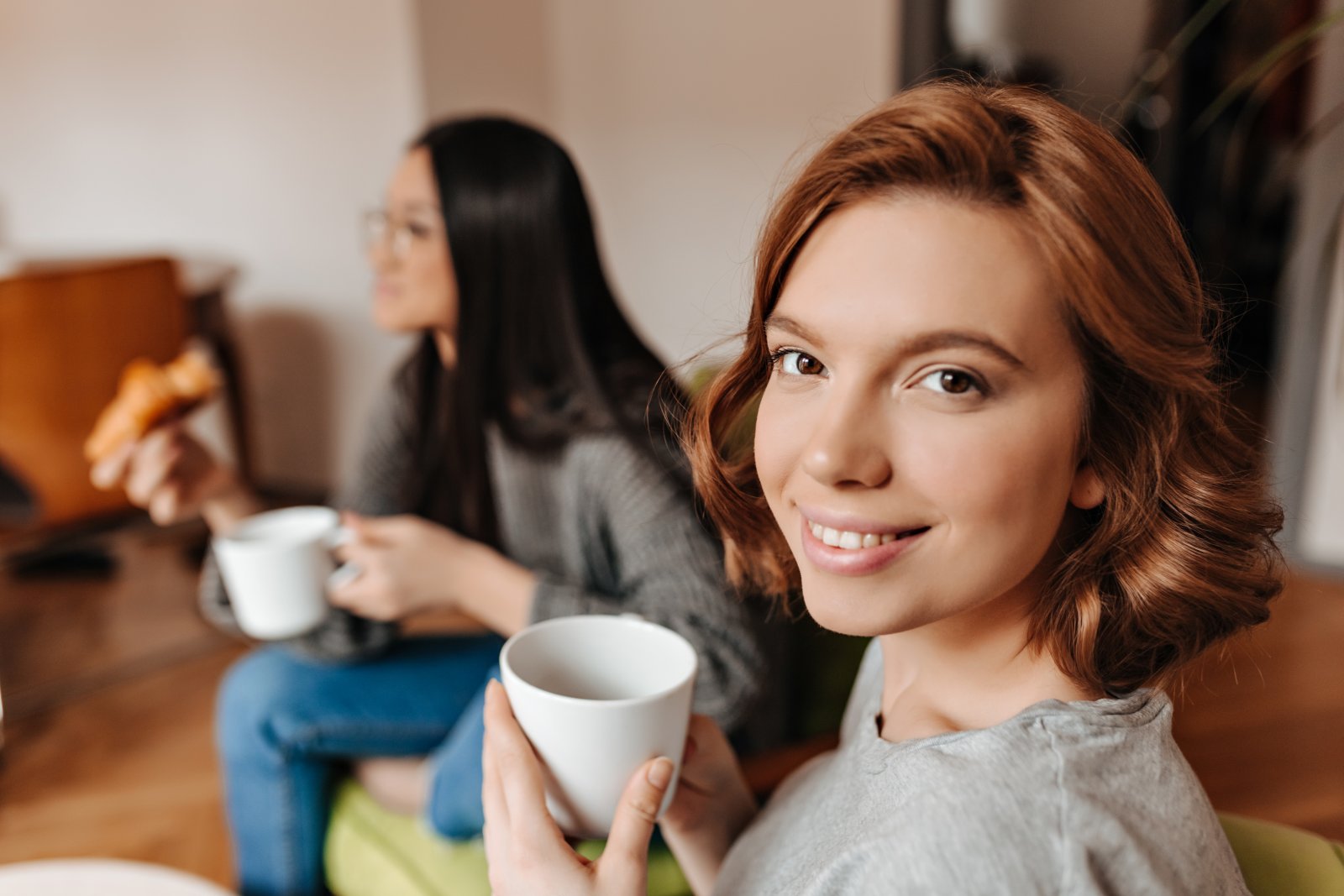 women enjoying hot drinks and pastries at home 2026 09 24 03 24 00 utc